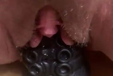 Burgergirlxxx playing with a black dildo